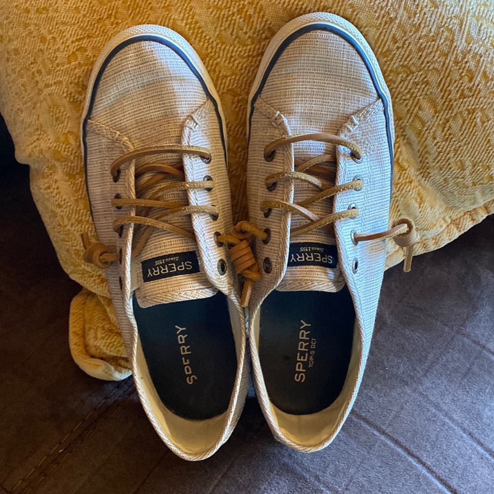 Used Womens Size 7M Sperrys. Oatmeal in color with Navy striping on bottom.